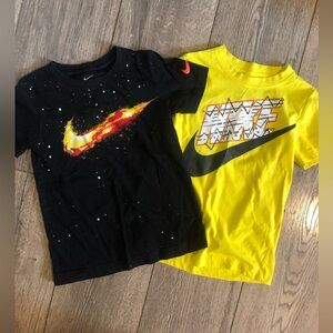 Two boys Nike shirts